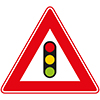 driehoekig verkeersbord rode rand met verkeerslicht